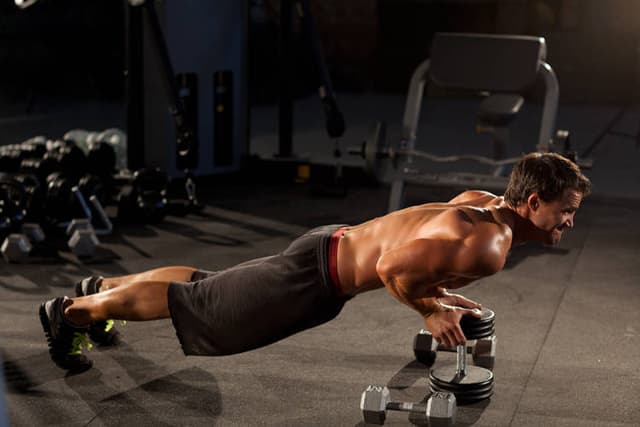 Close-Grip Push-Up off of a Dumbbell - view 2