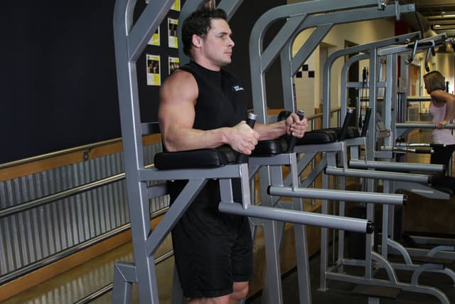 Knee/Hip Raise On Parallel Bars