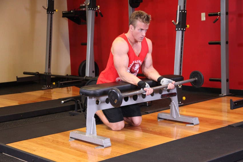 Palms-Up Barbell Wrist Curl Over A Bench