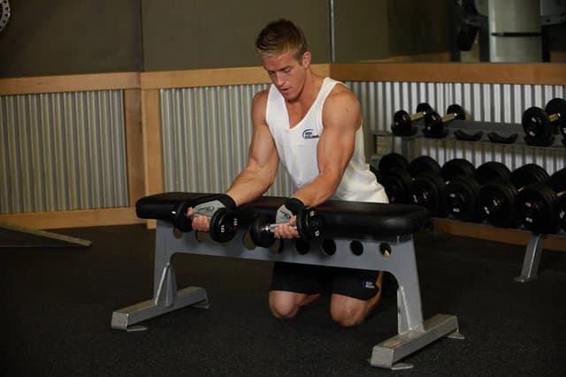 Palms-Up Dumbbell Wrist Curl Over A Bench
