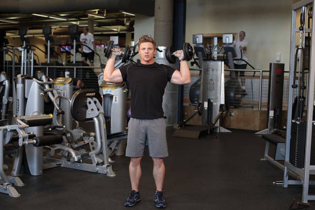 Standing Alternating Dumbbell Press