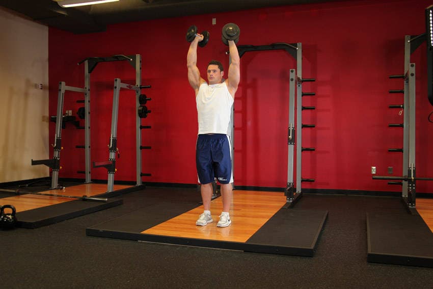 Standing Palms-In Dumbbell Press