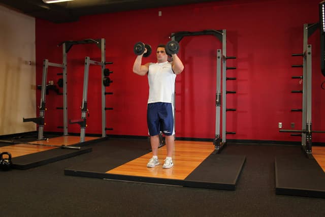 Standing Palms-In Dumbbell Press - view 2
