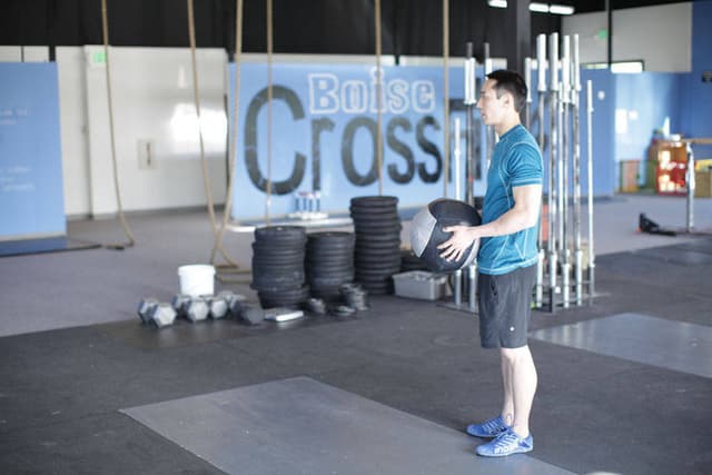 Standing Two-Arm Overhead Throw